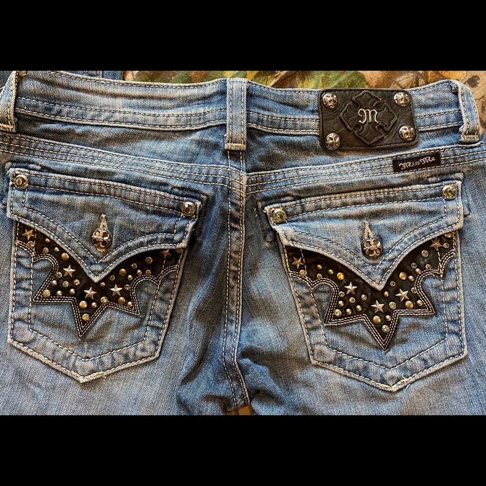 Cowhide butt pockets miss me jeans